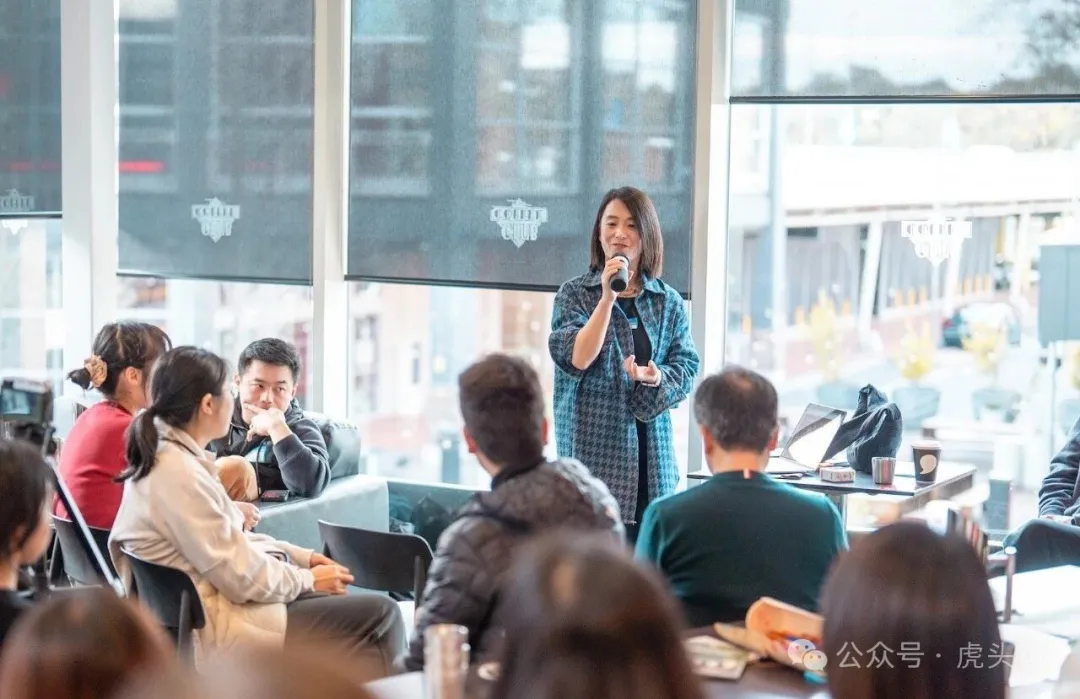 Michelle hosting an in-person sharing session