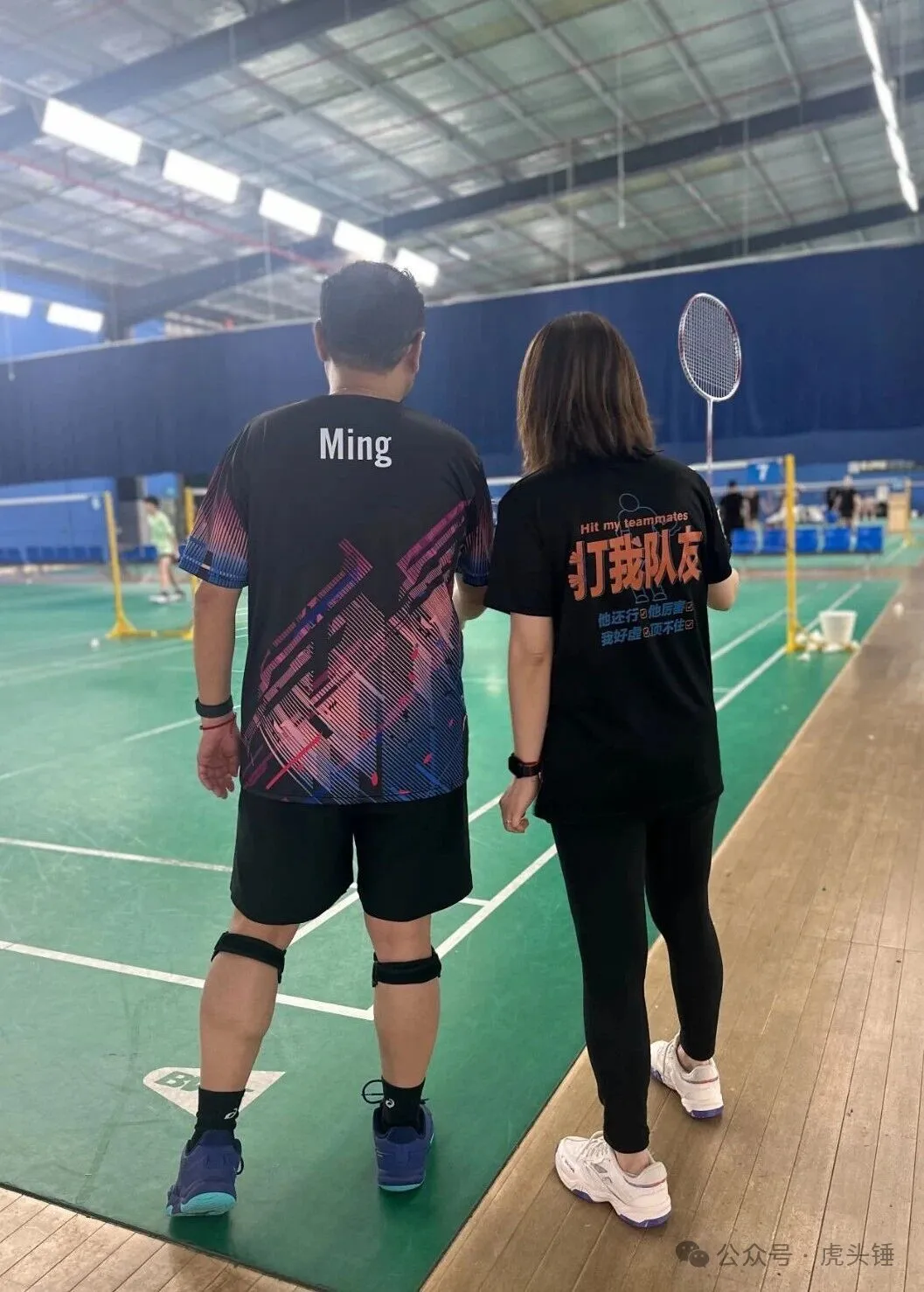 Ming and Ming Sao standing together on the badminton court
